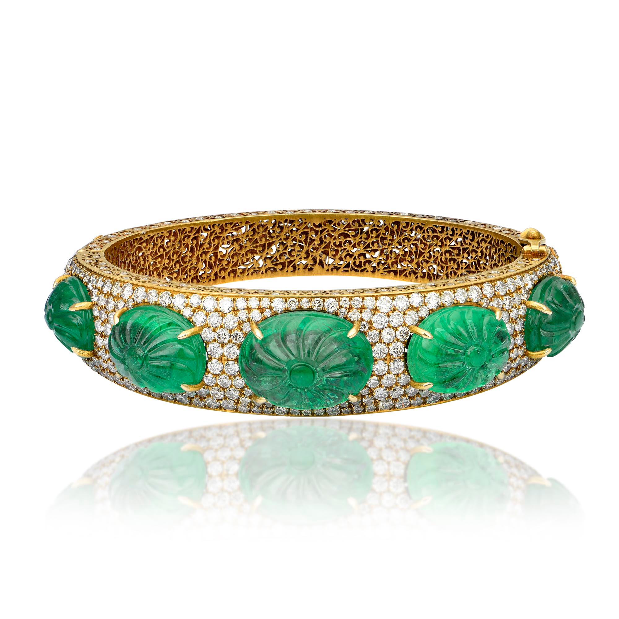 Carved emerald cabochons set in 18K yellow gold bangle with diamonds