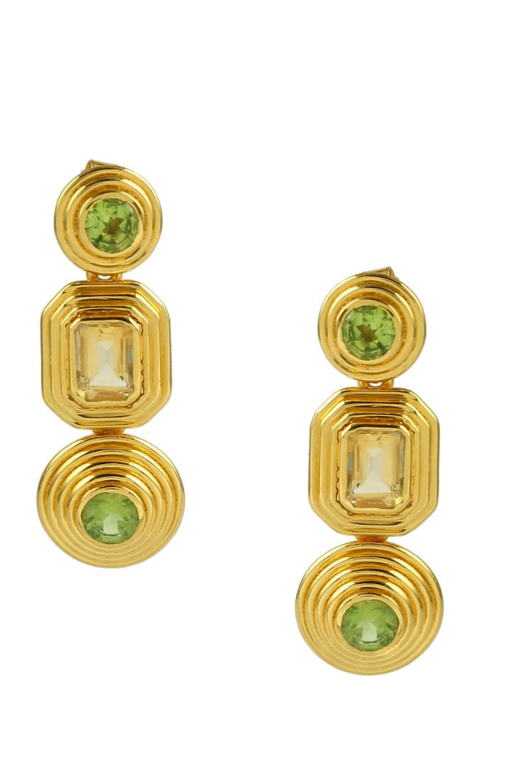 Gold cascade earrings with green and yellow gemstones on a white background