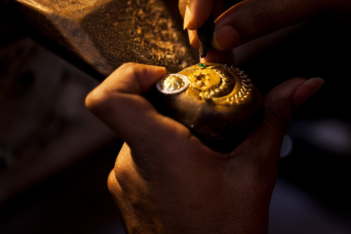 Gold and emerald Indian jewelley being crafted in Amrapali's workshop