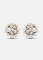 A pair of 18K white gold stud earrings with a central pearl cluster and smaller pearl accents.