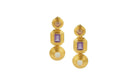 Gold earrings with purple and white stones on a white background