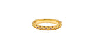 Gold bangle with embedded purple and yellow stones on a white background